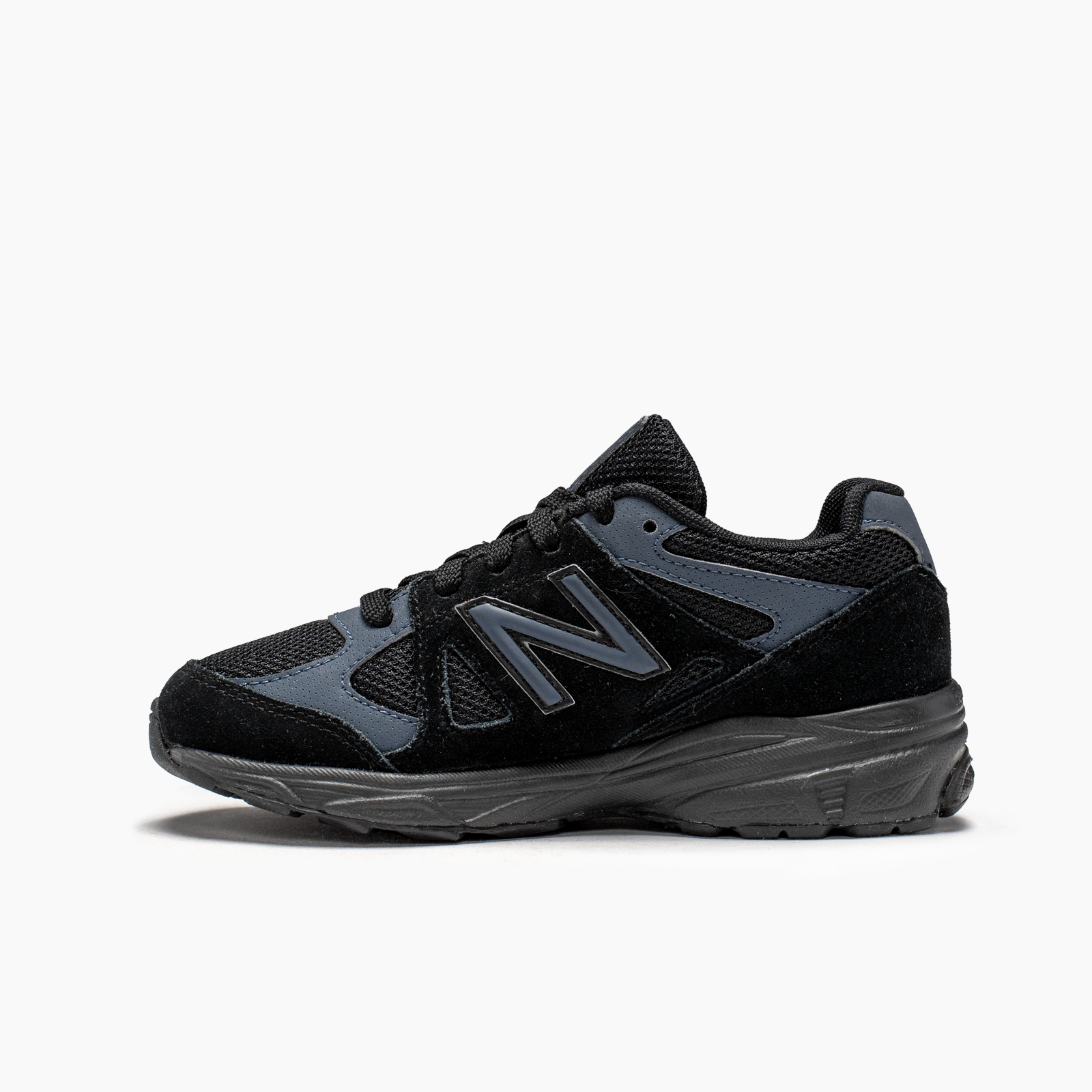 New Balance para niño negro casual 