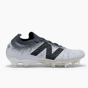 New Balance para juvenil gris fútbol