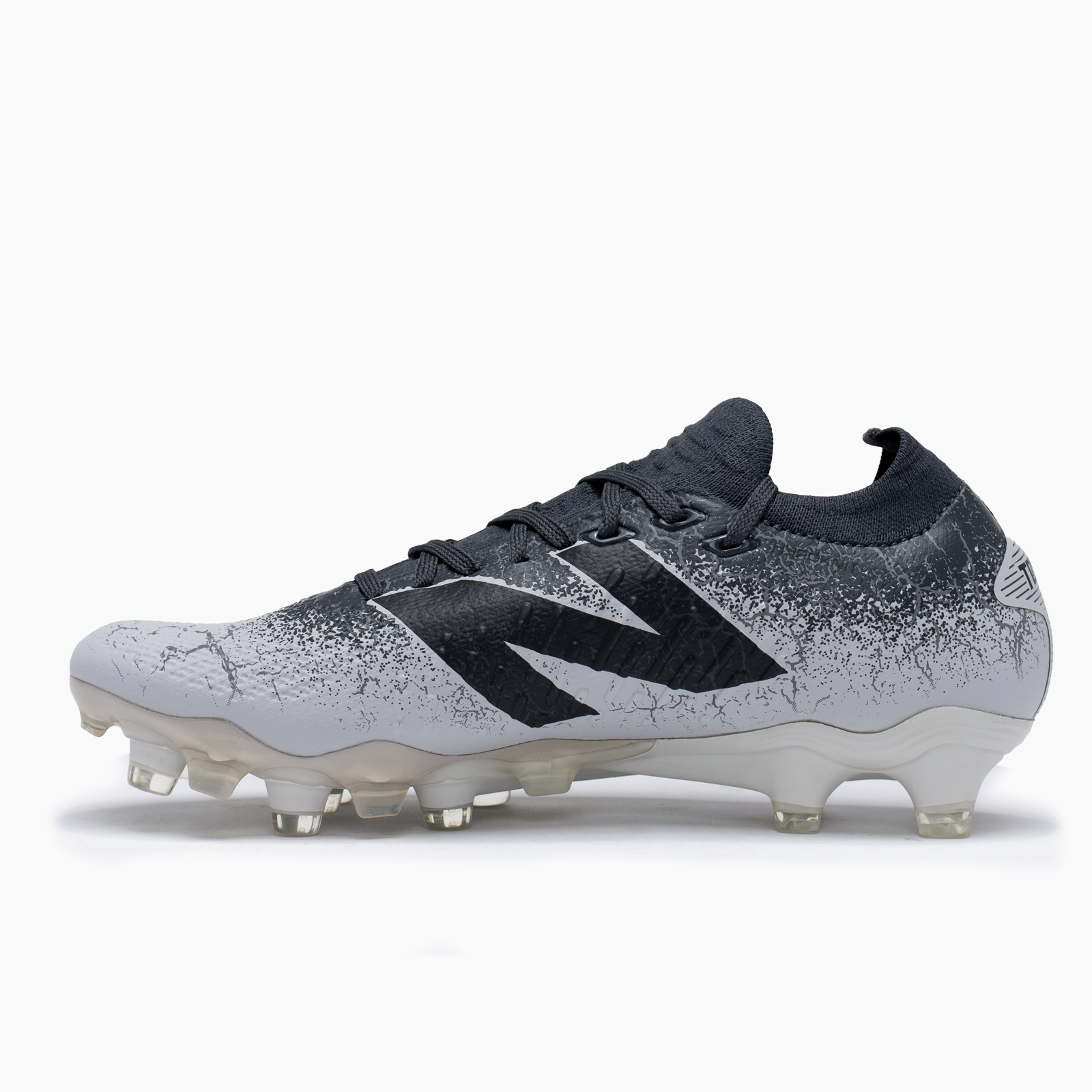 New Balance para juvenil gris fútbol